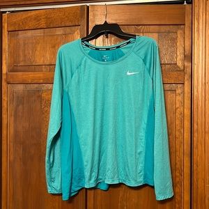 Nike running long sleeve, dry fit jersey in a blue green